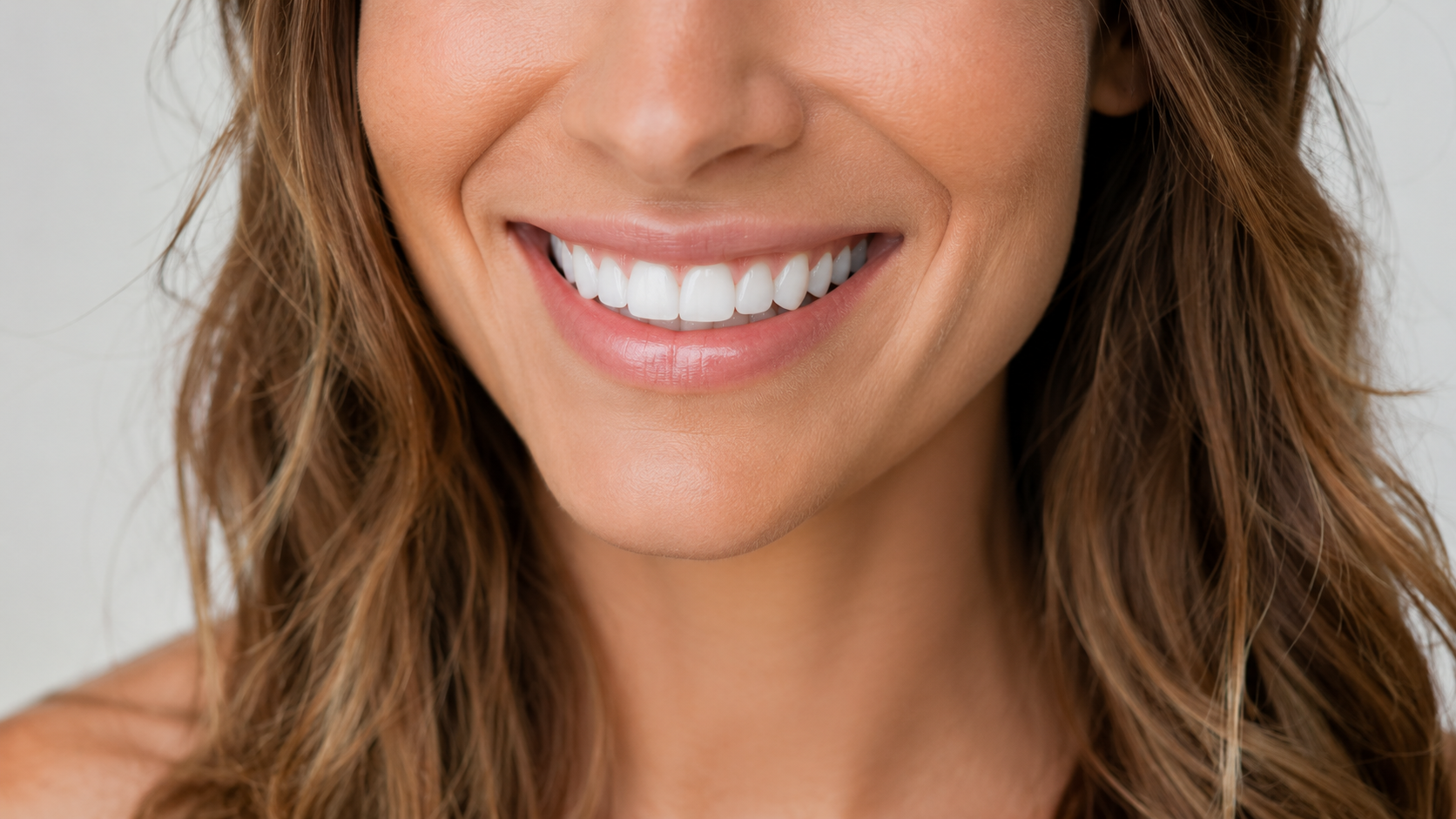 A bright, even Hollywood smile after a cosmetic dentistry makeover